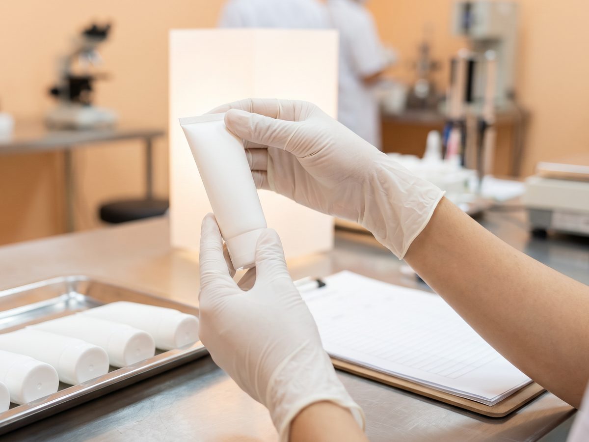 China-based quality inspector checking cosmetic packaging before shipment
